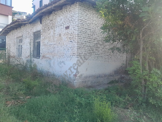 Land and building for sale in Haki Stermilli street, in the Kombinat area of Tirana, Albania.
The l